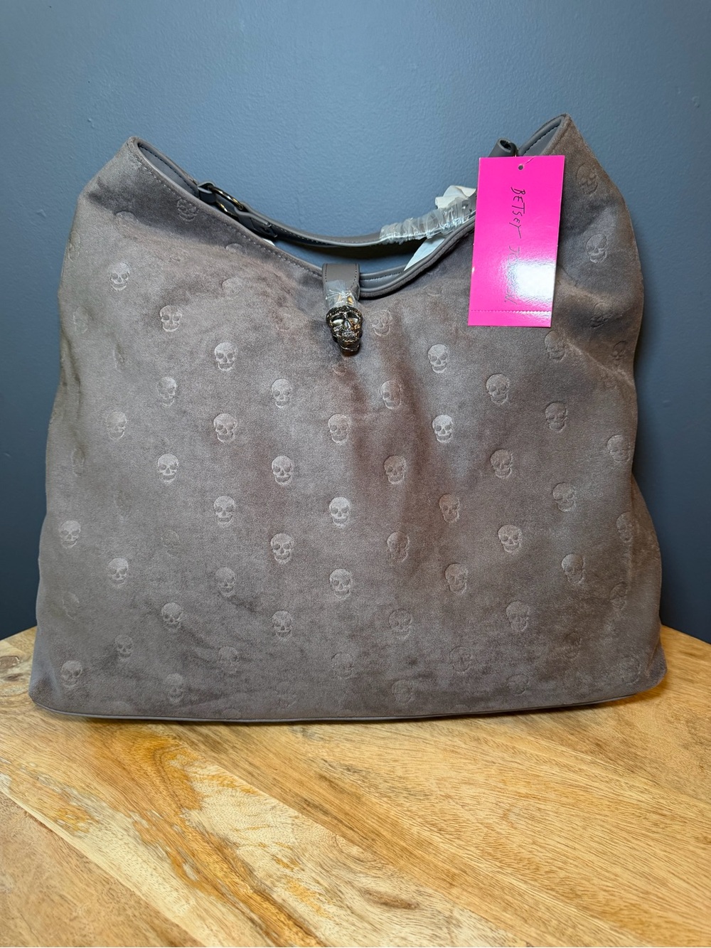 Betsey Johnson Women’s Grey Suede Shoulder Bag with Subtle Skull Embossing